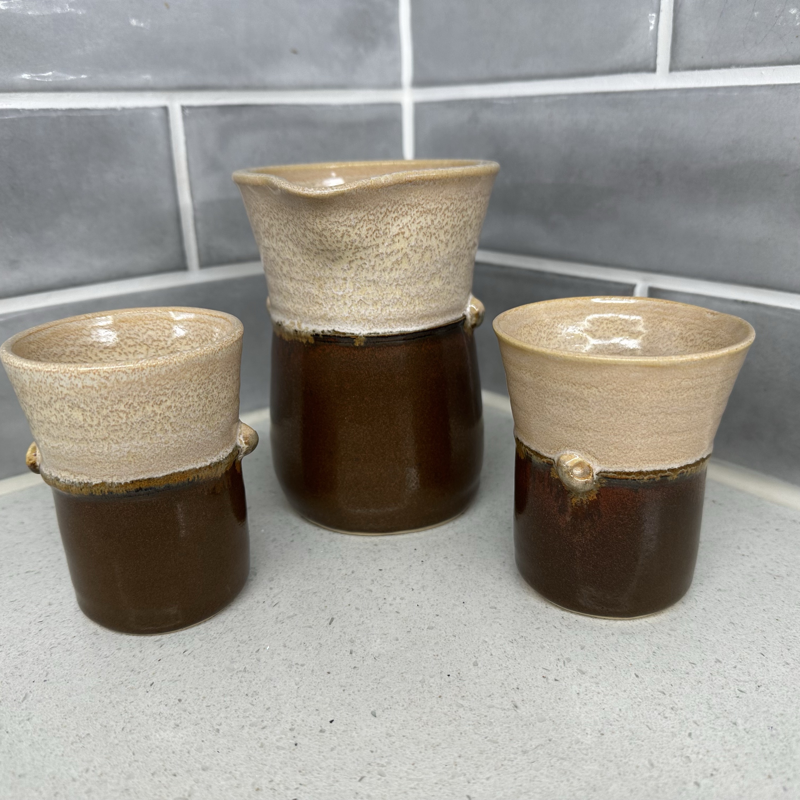 Pitcher and two mugs